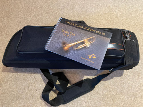 A book on a trumpet case
